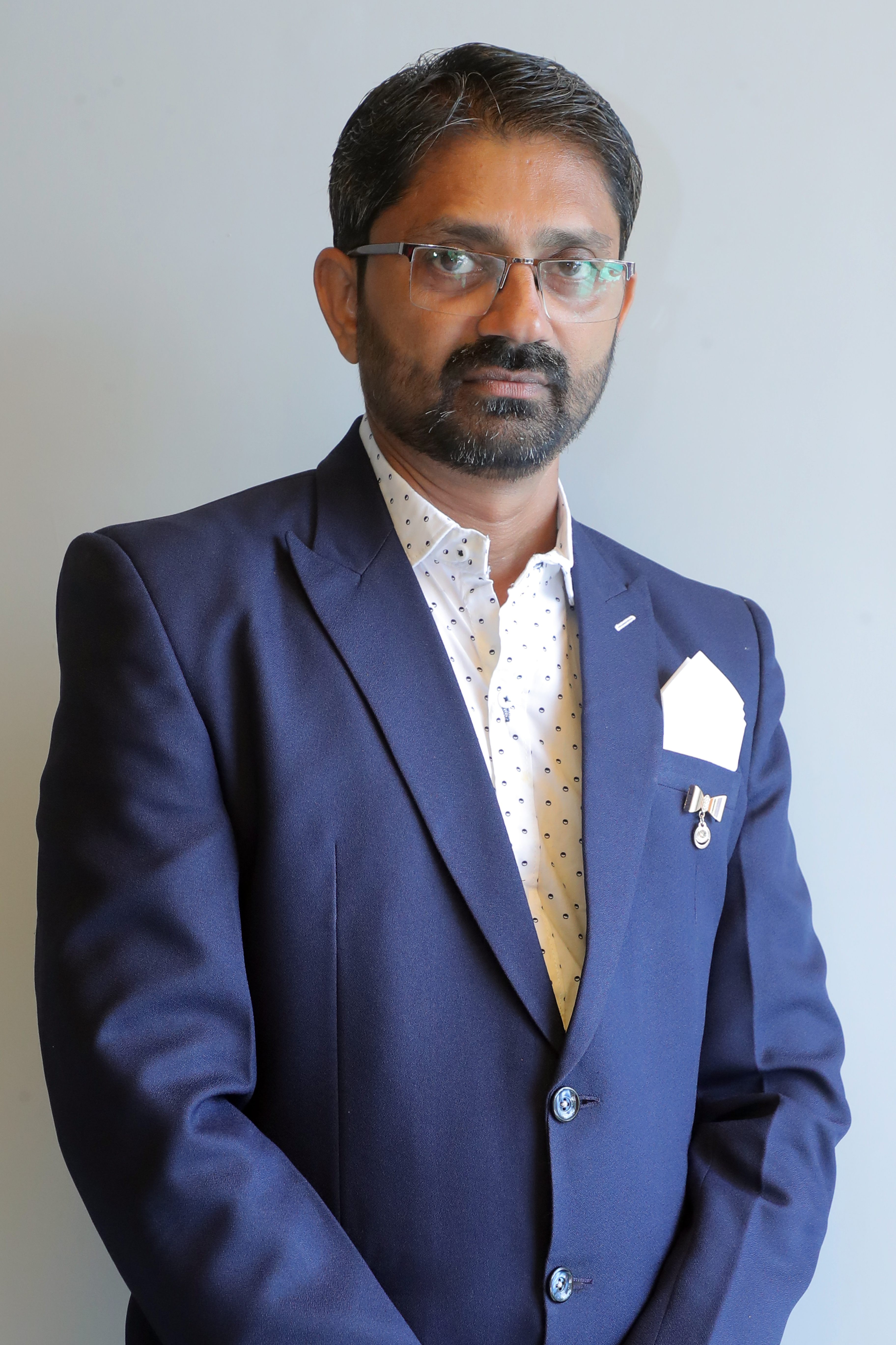 Mr. Naimish Thoria